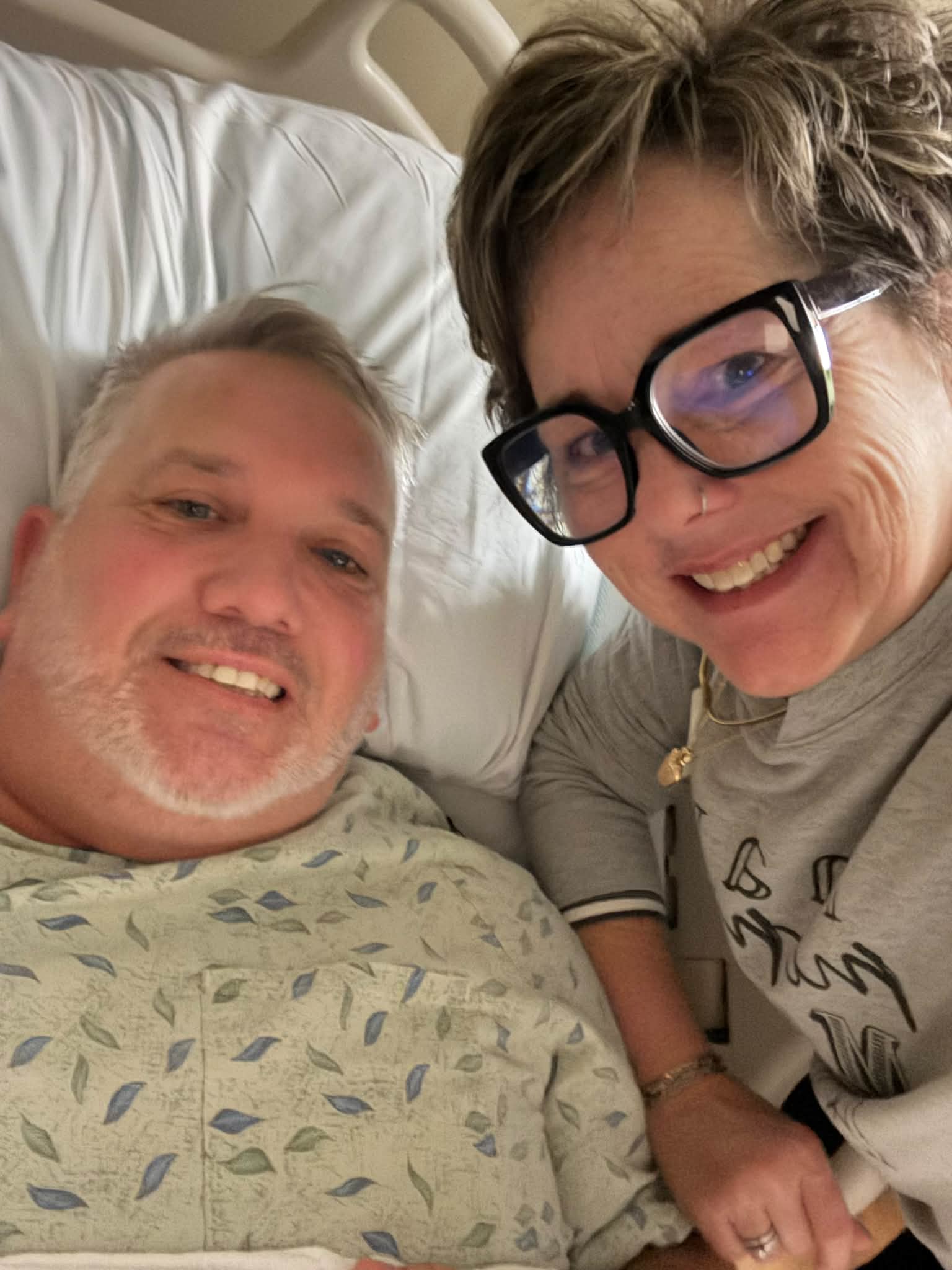 💥Update on Chris Heiby after his TWO back surgeries:
👉🏼Both surgeries went well. Had a little scare with his blood pressure last night but the staff had it back to normal within an hour. 
👉🏼Today…He has been up twice now. One time he walked 90 feet with PT. Second time was to the wheelchair to take him to radiology. I got to see all of his new back hardware! 
👉🏼Currently he’s sitting in recliner watching the LSU game on his phone. 
🥰All of your prayers are much appreciated. Pain will get more intense but so far has been managed. PT said Monday would be the earliest he could possibly go home. He has to be able to walk without dizziness and be able to go up stairs since he will have to do that once home in order to get into our house.